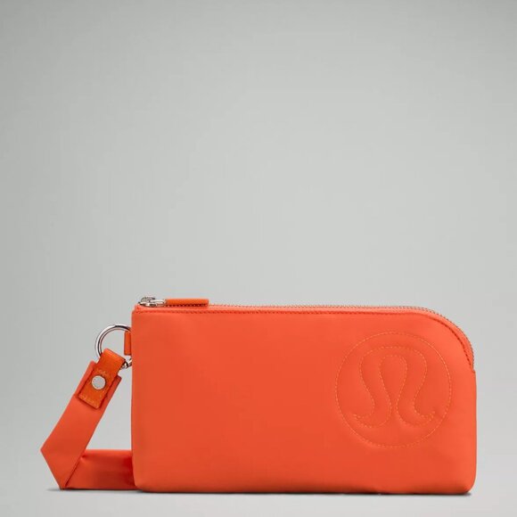 lululemon athletica Handbags - Lululemon Now and Always Puffy Pouch Wristlet in Orange